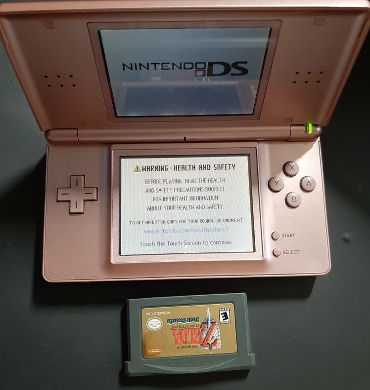 Nintendo DS Rose Gold With Zelda Game