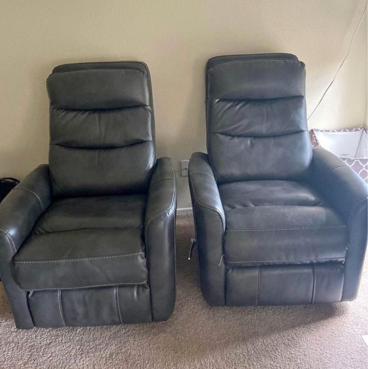 2  Grey Leather Recliners 