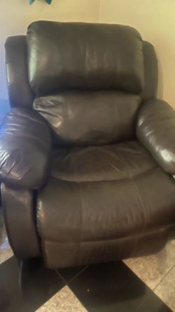 Leather recliner, looks like new, Ashley