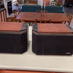 Vintage Bose speakers with wall mounting brackets