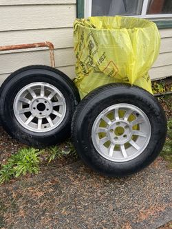 Set (2) Jeep Cherokee Comanche 10-Spoke wheels with 215-75R15 tires 