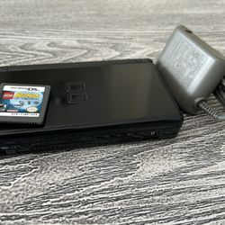 Black Nintendo DS in excellent condition with Lego Batman game, complete with stylus & charger.  $65