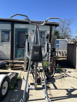 Pull Up Bar, Abb Machine, And Punching Bag Combo