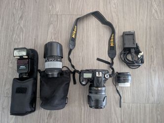 Nikon D90 with 3 Lenses and Flashlight