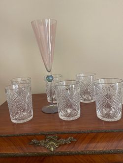 6 crystal glasses plus One Champagne glas