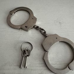 Steel chain linked handcuffs for security