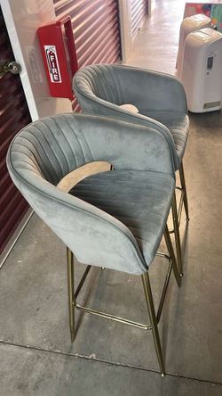 Gray used velvet bar stools with gold legs