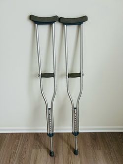 Adjustable crutches