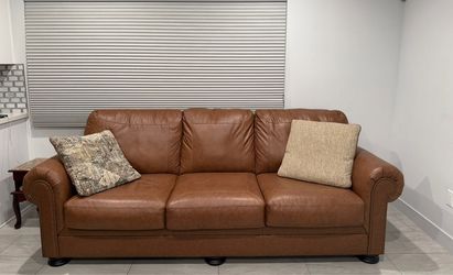 Brown sofa (bed)