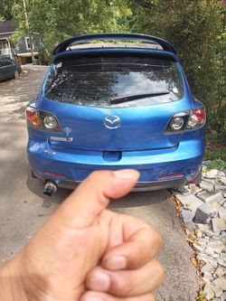2005 Mazda 3 hatchback, 5-speed manual transmission, 193,513 miles. It is in good condition; I am selling it because I don't use it. It is being sold 