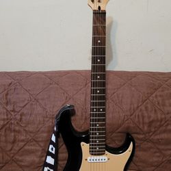 CORT G SERIES 6 STRINGS ELECTRIC GUITAR MODEL G110 MADE IN INDONESIA IN BLACK COLOR. 