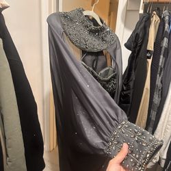 This dress is a new, never-worn design, absolutely gorgeous.