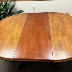 Round Pedestal Table W Hidden Leaf