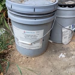2 Five Gallon Buckets Of Orange And Dark Green Paint 