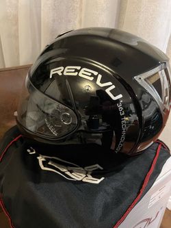 Innovative Reevu RV MSX1 full-face motorcycle helmet in black metal. This size XL helmet has a built-in rear-view mirror system. It is DOT and ECE cer
