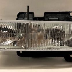 1(contact info removed) Chevy 1500  GM NOS Headlights 