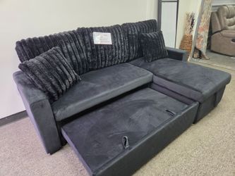 New Black Sectional with pull out bed