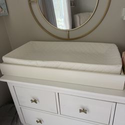 Changing table topper for dresser with the changing pad
