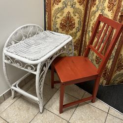 rare wicker vanity with red chair 