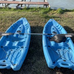 2 kayaks and 1 paddle