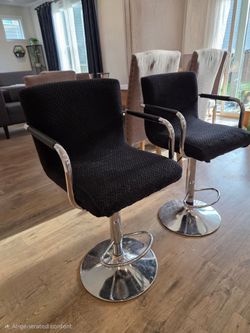 Pair of Black Textured Swivel Bar Stools