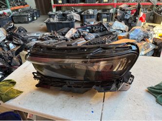 Jeep grand Cherokee Left Headlight Oem