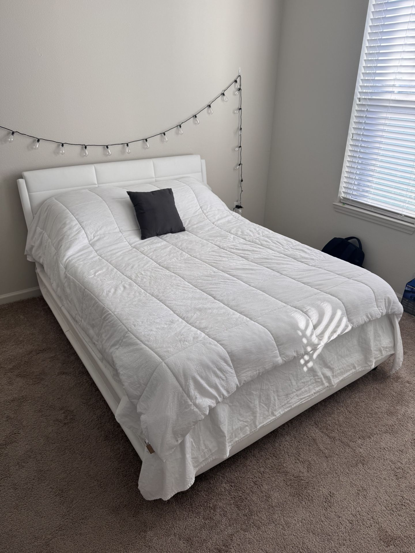 Queen size Arghira PU upholstered sleigh platform bed frame