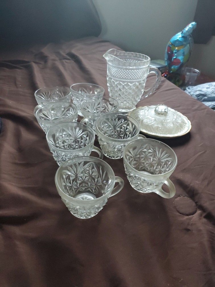 8 Cups An A Small Pitcher 