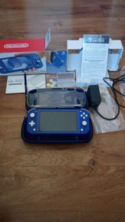 Nintendo switch lite blue with accessories