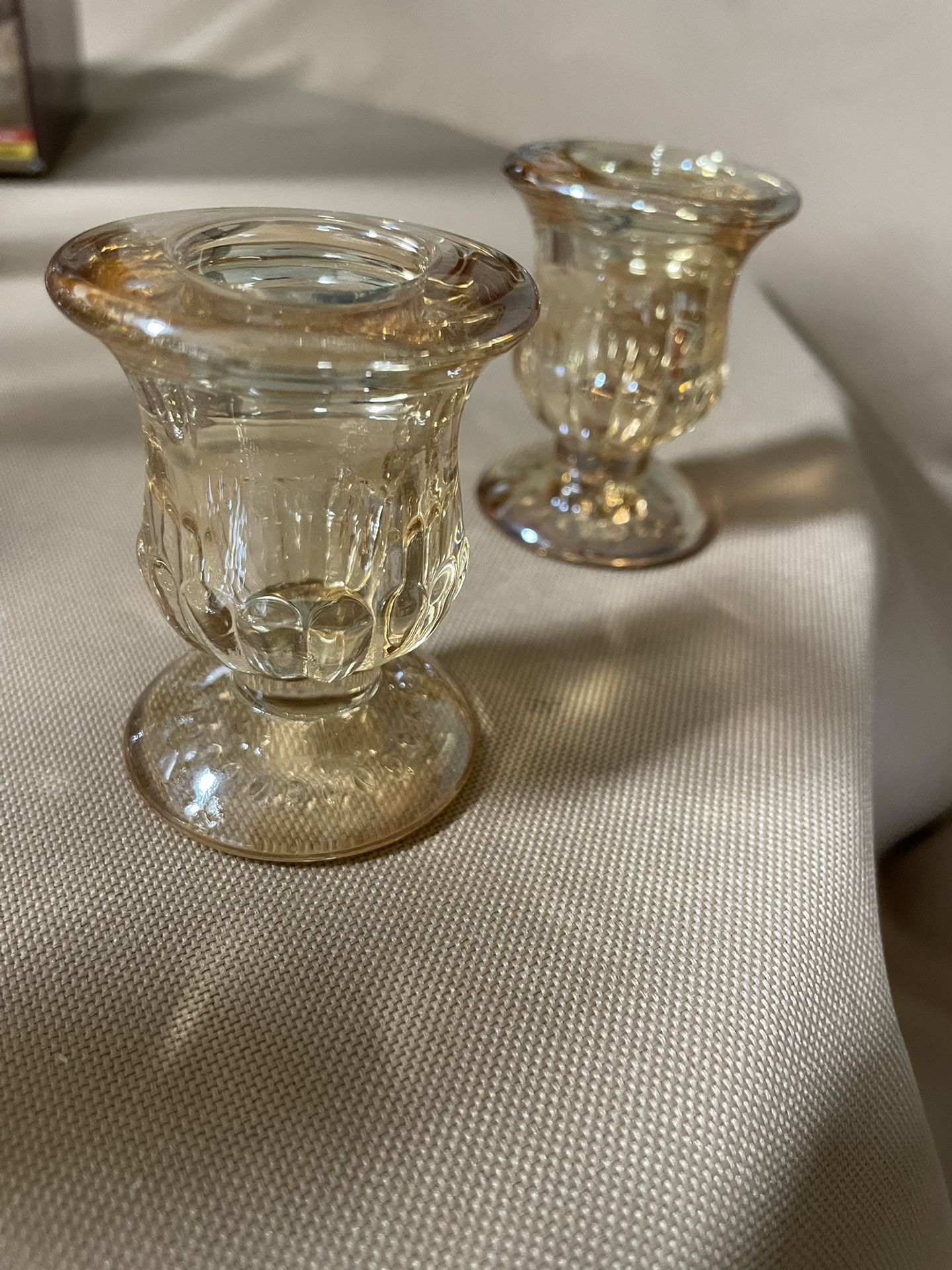 Iridescent glass candle stick holders