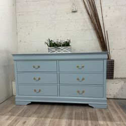 Beautiful Real Wood Dresser In A Soft. Lue And Gold Handles