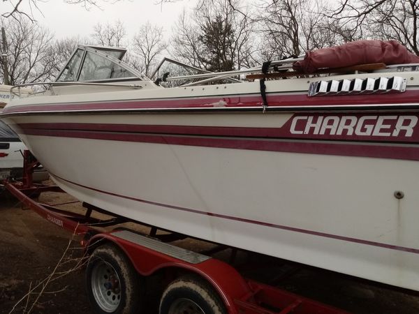 21ft charger w trailer runs great put in new floor carpet new stereo and speakers new seat new fish