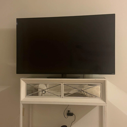 Tv and Dresser with Roku Device