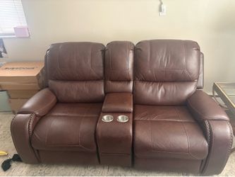 Leather reclining sofa