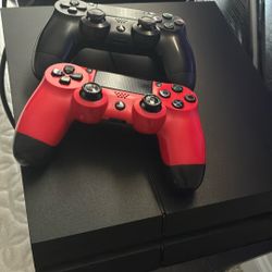 PlayStation 4 With 2 DualShock Controllers 