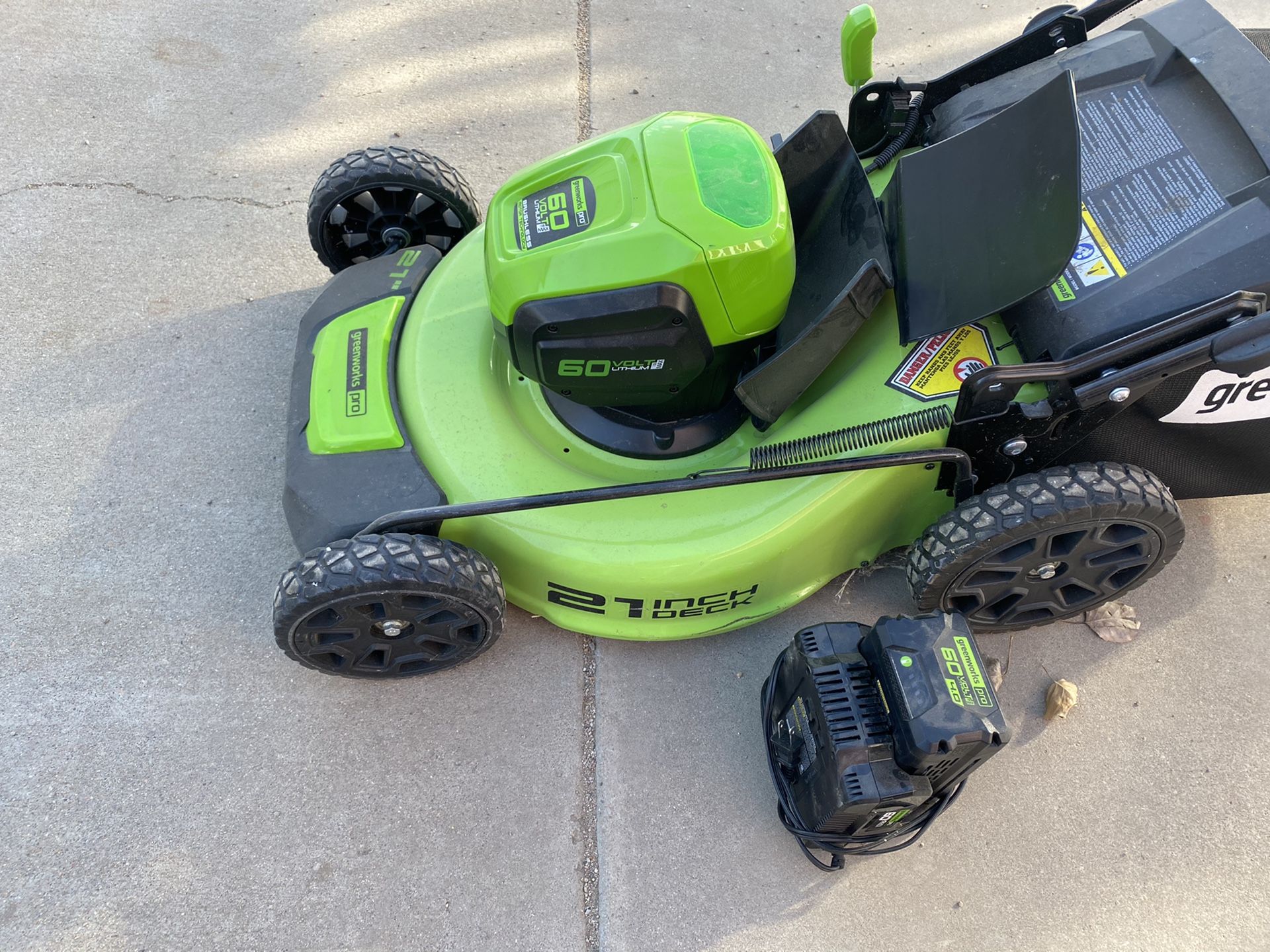 Greenworks Pro Brushless Electric Lawn Mower. Used one time