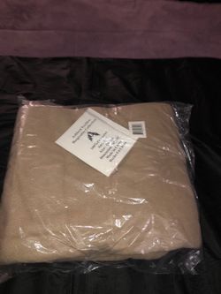 100 % polyester tan Blanket