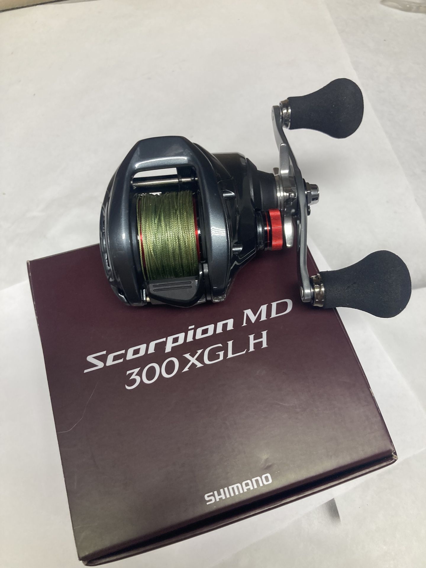 Shimano Scorpion MD 300 XGLH, Barely Used, Spooled With 65lb Suffix Braid. Used 1 Day Of Fishing.