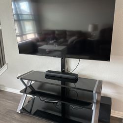 65” TCL Roku TV and sound bar/subwoofer, stand