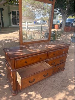 Solid pine dresser has a warm honey finish