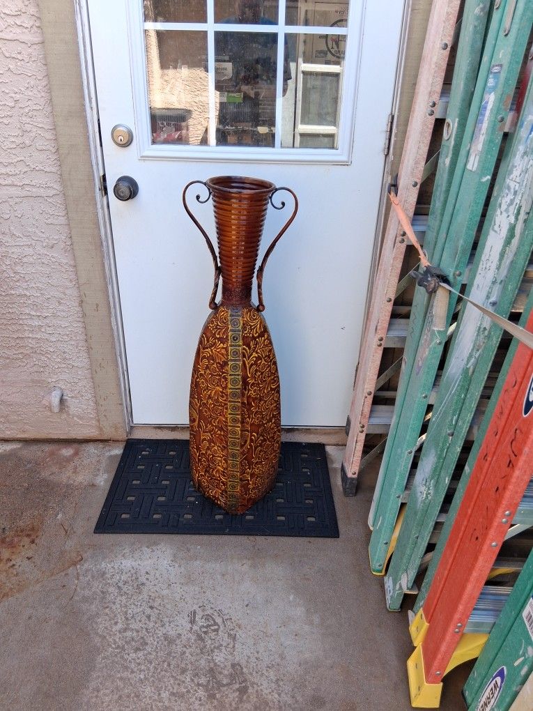 Decorative ornate metal vase