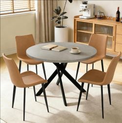 Almost new - Dining table and 4 chairs