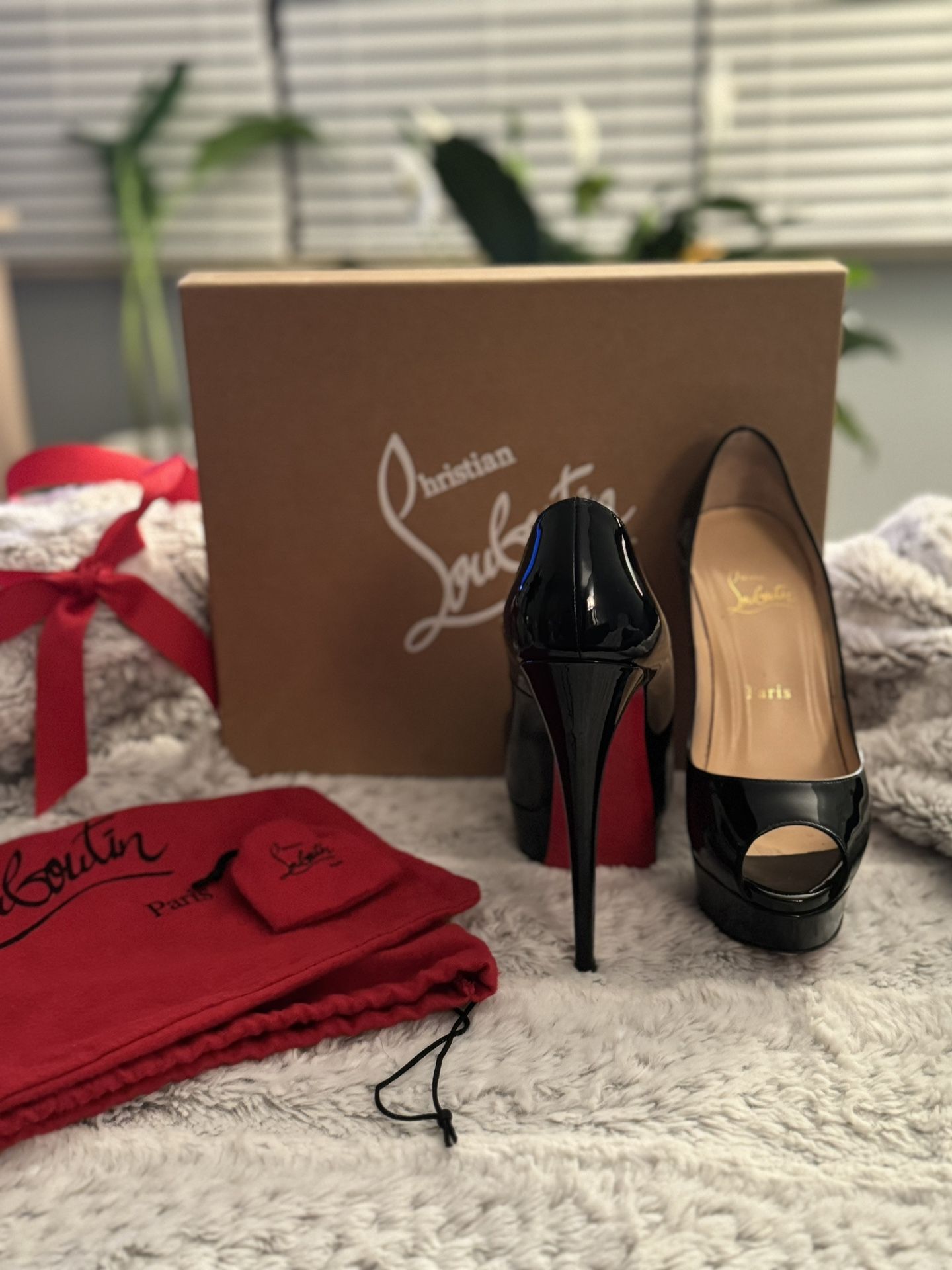 USED: Christian Louboutin Heels