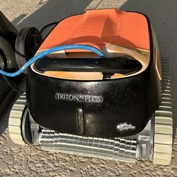 Dolphin Triton PS Robotic Pool Cleaner w/Superior Scrubbing Power  