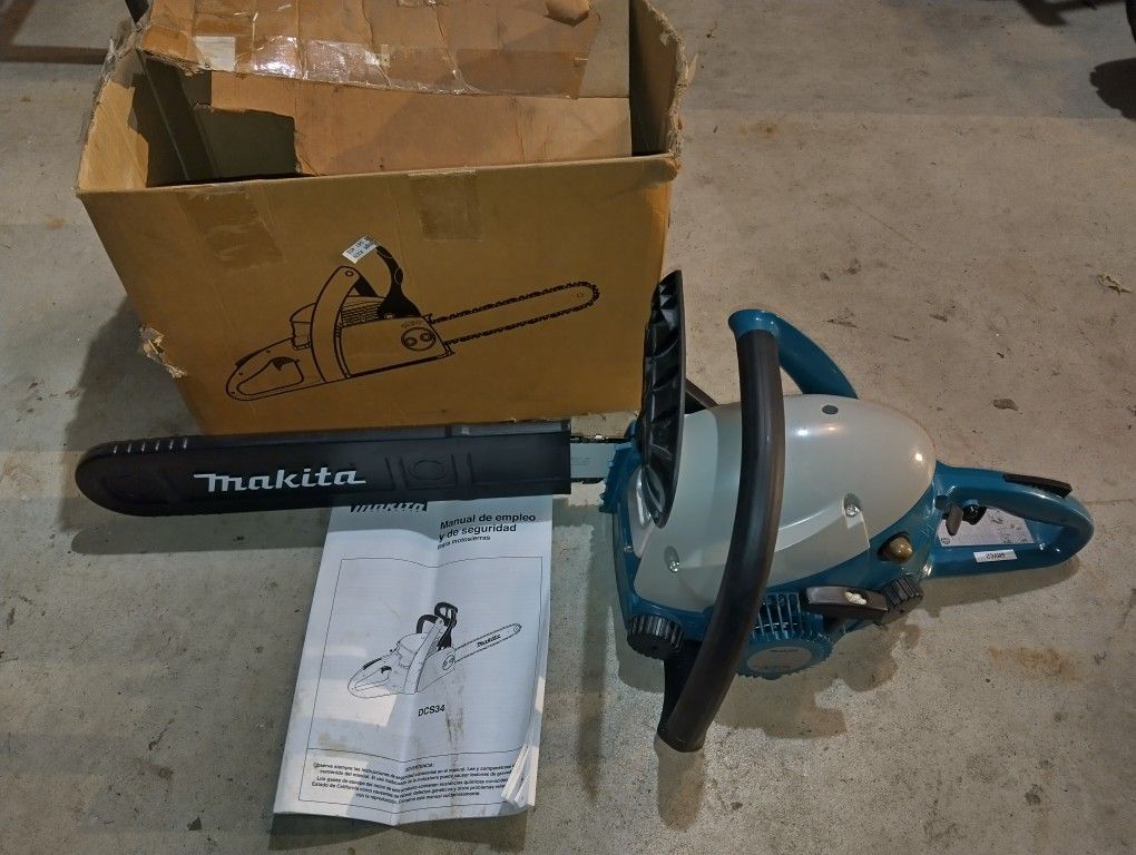 Chainsaw   new.  MAKITA  16 ".   Never Used.  $200. Obo. 