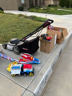 Free curb - electric mower, great toys