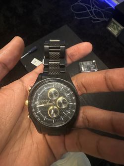Black and gold Armani exchange watch