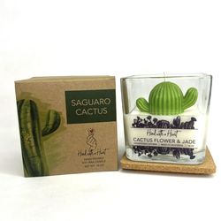 New, unlit Cactus flower & Jade Soy Wax Candle. I don’t like the cactus scent but other people do. Smells good to some people