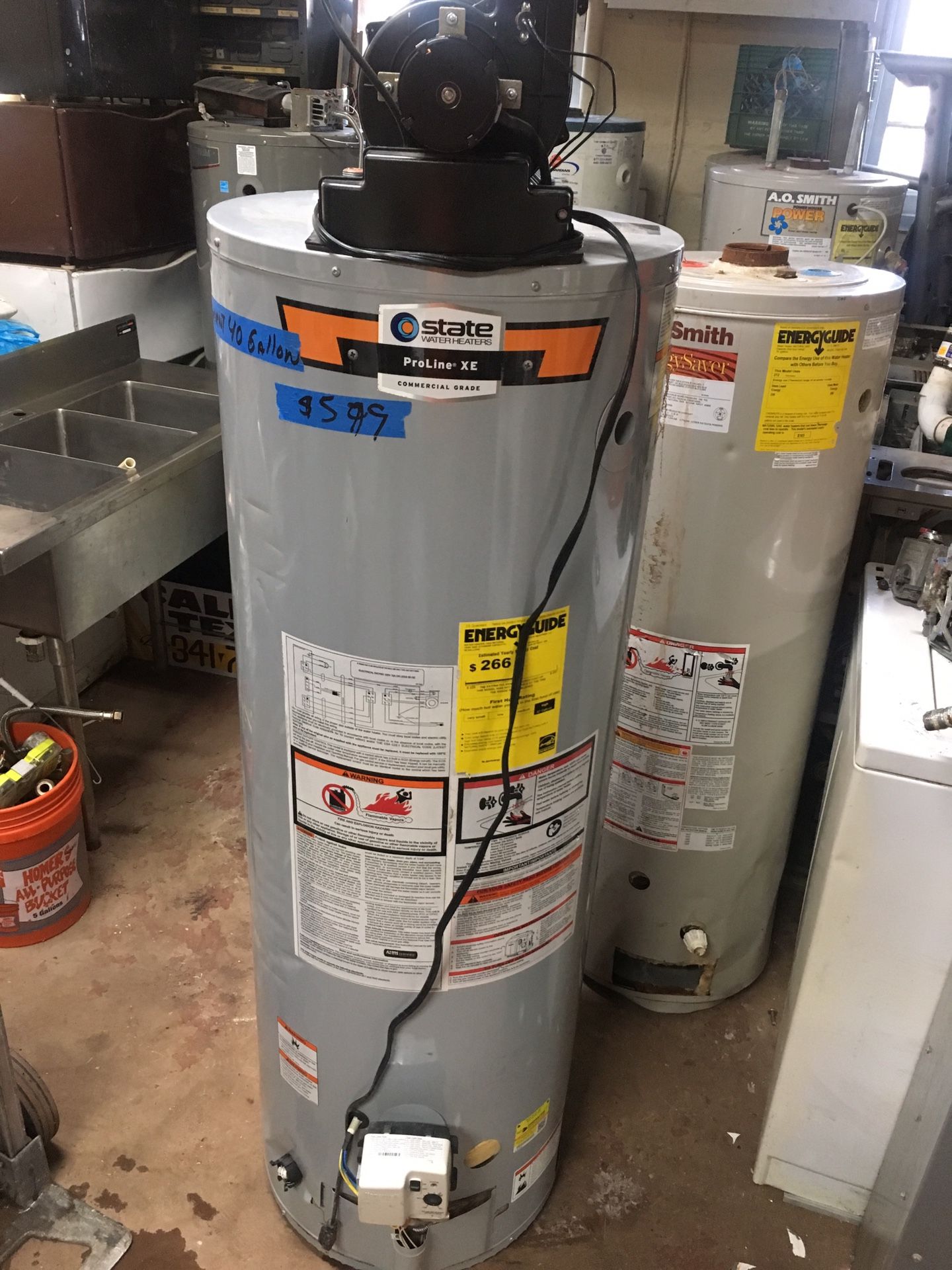 Power vent water heater and electric water heater