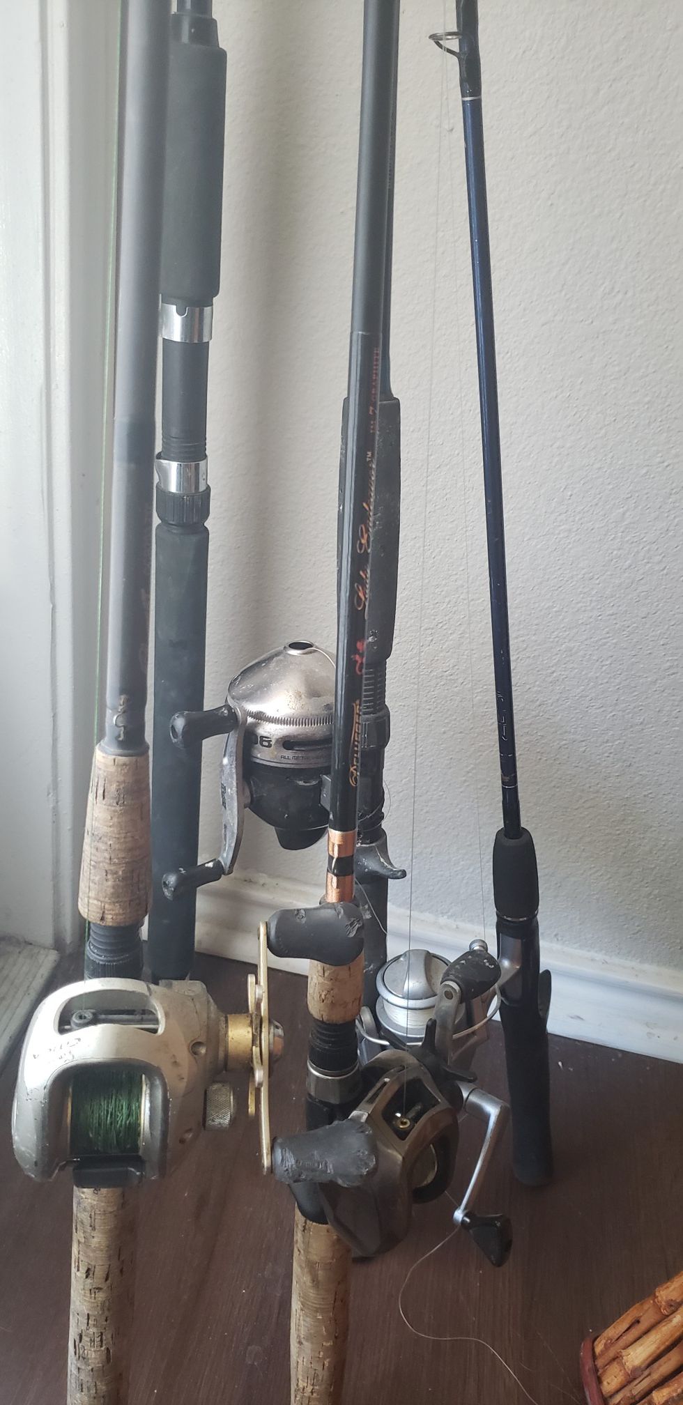 Multiple fishing poles, rods, tackle box